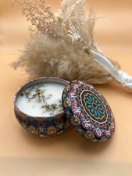 Zodiac pattern candle tin with chamomile flowers and Aphrodite fragrance oil